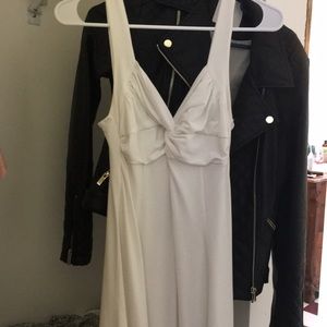 White Marilyn Monroe style dress.